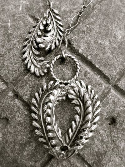 Silver fern fronds arranged in a heart shape