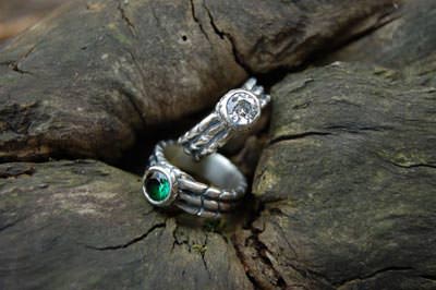 Banded rings set with topaz and moissonite